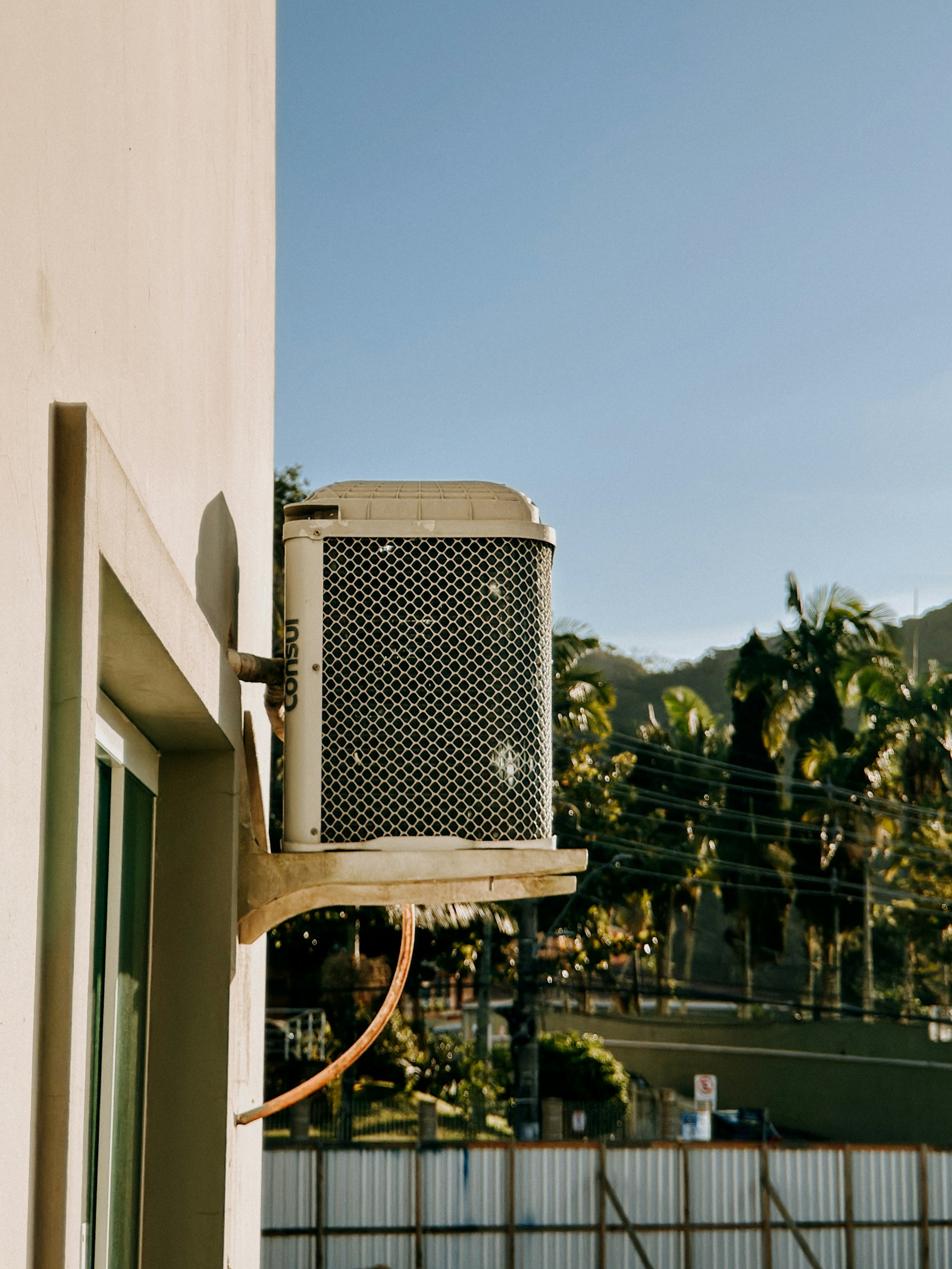 Residential cooling equipment in summer light